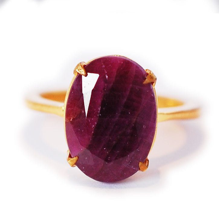 Custom ruby statement ring set in yellow gold and designed by Abby Sparks Jewelry