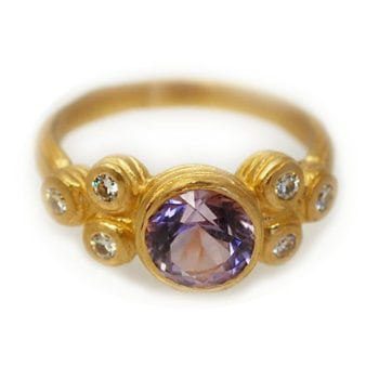 Custom handmade engagement ring made with 14k yellow gold and 1.5 carat amethyst with diamond accents custom made and designed by Abby Sparks Jewelry, The Amy.
