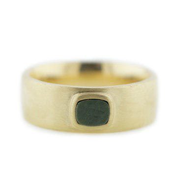 Custom men’s wedding ring made with 14k yellow gold, 0.58 carat custom cut river rock, and matte finish custom made and designed by Abby Sparks Jewelry, The Matt.