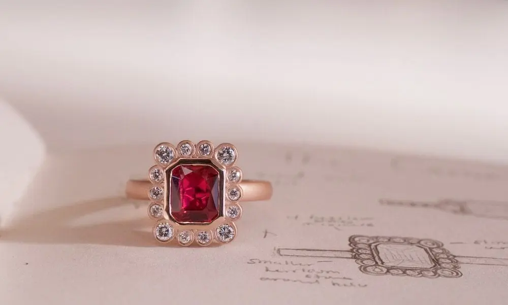 A custom ruby and diamond ring sketch designed by Abby Sparks Jewelry