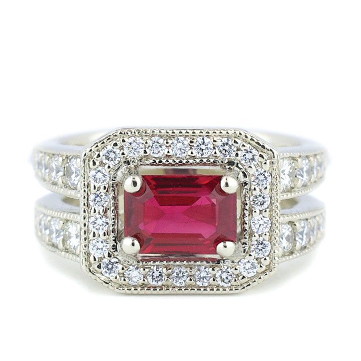 A custom ruby engagement ring with a white gold split band designed by Abby Sparks Jewelry