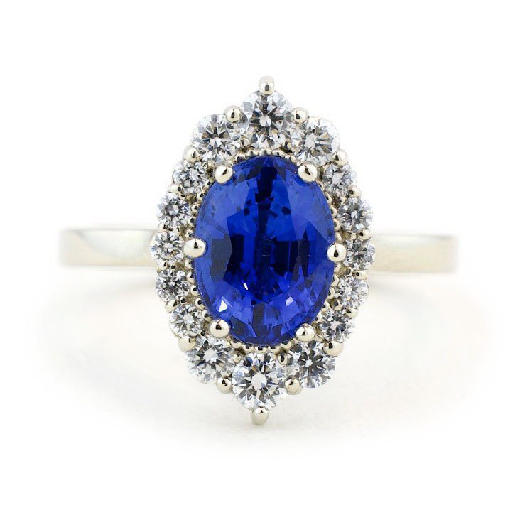 Oval Bright Blue Sapphire Halo Ring