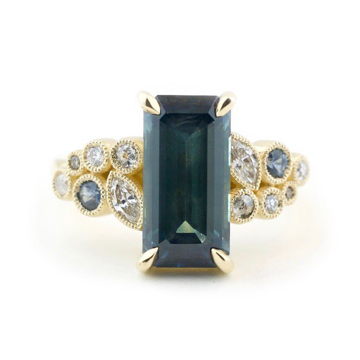 Emerald cut teal sapphire engagement ring made for Laura by Abby Sparks Jewelry