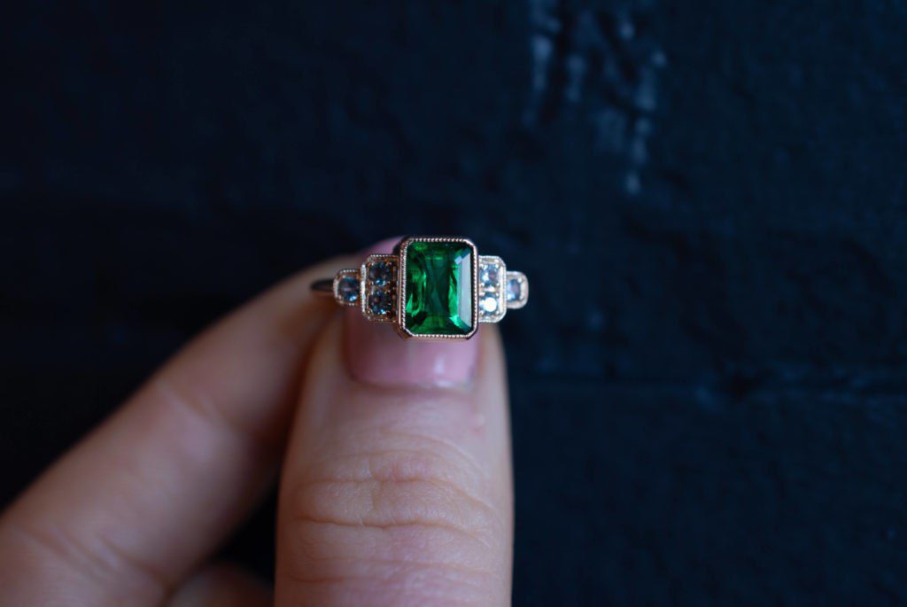 The Kate, custom emerald engagement ring designed by Abby Sparks Jewelry