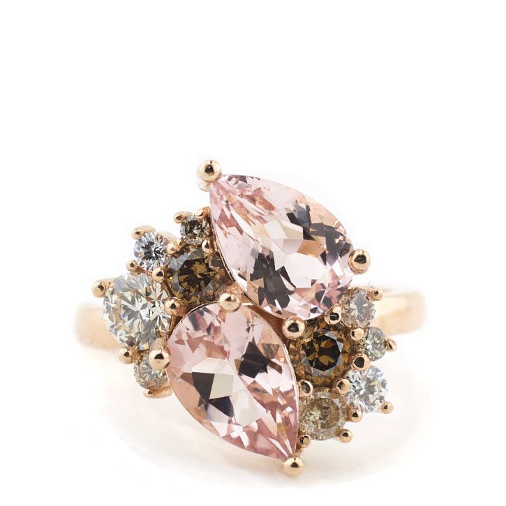 Stunning pink colored gemstone engagement ring designed by Abby Sparks Jewelry.