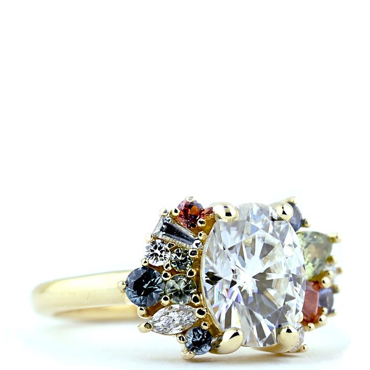 The Mae, a moissanite and colored gemstone engagement ring designed by Abby Sparks Jewelry. 