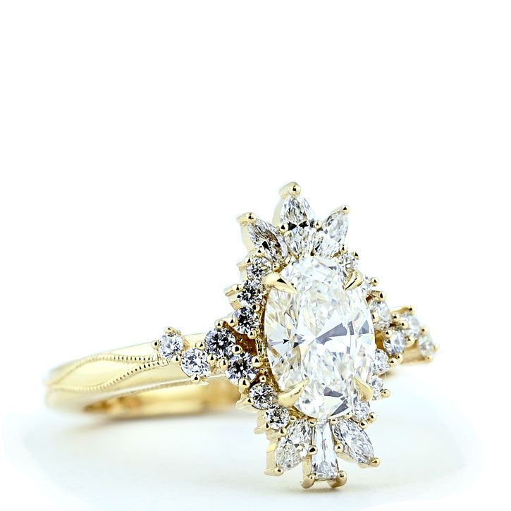 The Katie, a custom made oval diamond engagement ring ethically sourced and designed by Abby Sparks Jewelry