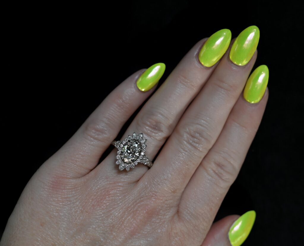A flower inspired engagement ring named the Brandi and custom designed by Abby Sparks Jewelry